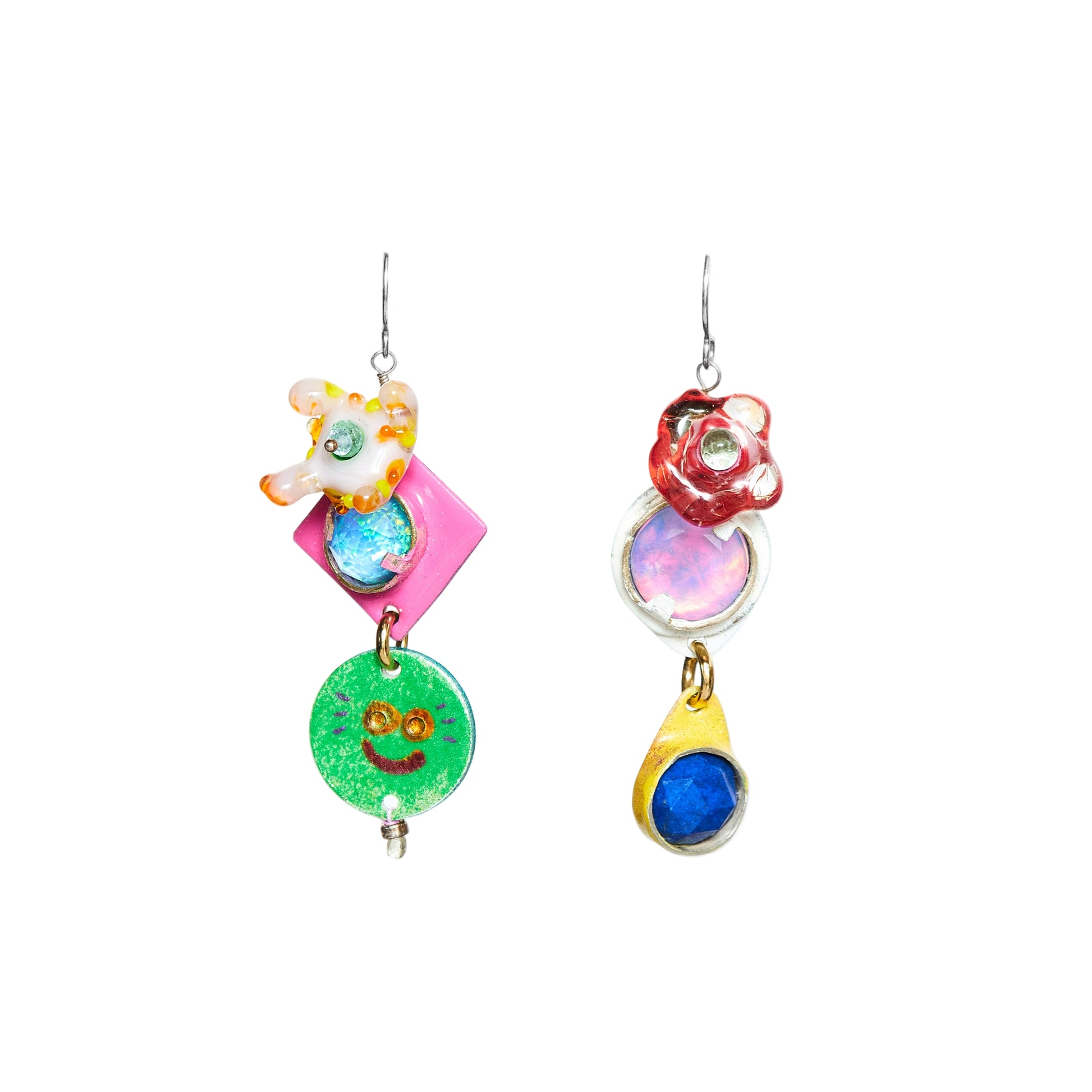 Colorful mismatch earrings on a white background