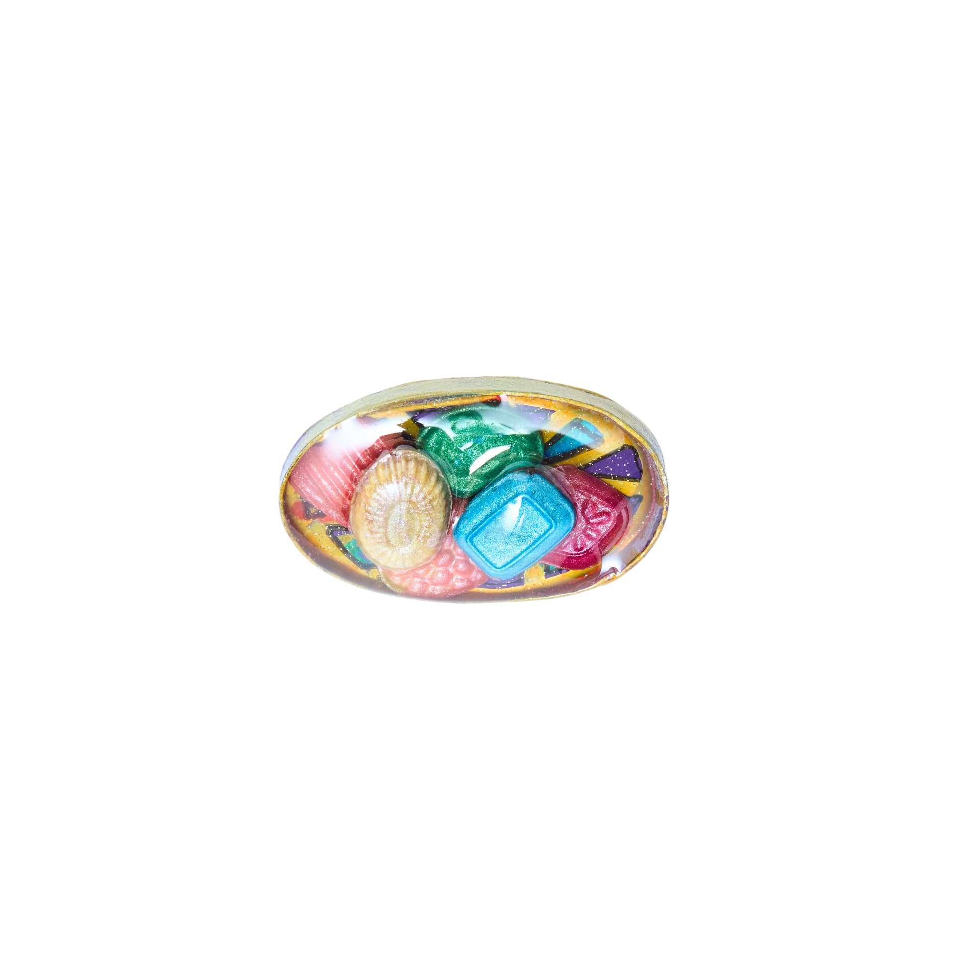 Colorful brooch that looks like a bowl of candy pictured on a white background